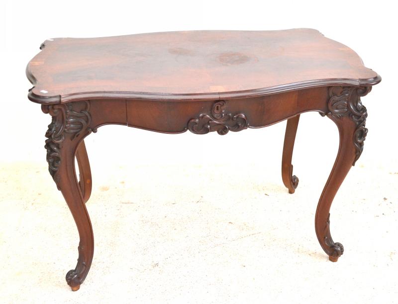 Appraisal: A CONTINENTAL STYLE MAHOGANY FINISHED SINGLE DRAWER TABLE A CONTINENTAL