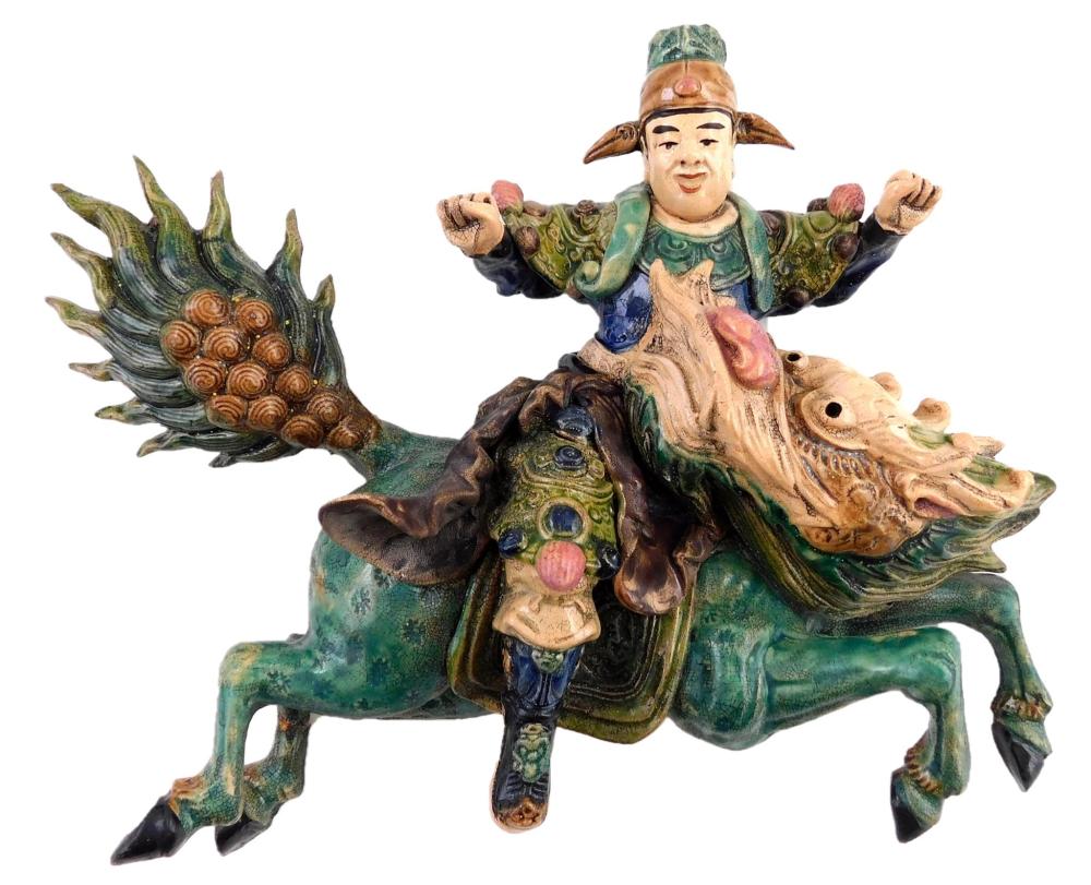 Appraisal: ASIAN Chinese figural pottery roof tile featuring a warrior mounted