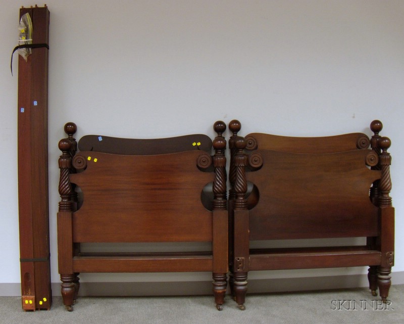 Appraisal: Pair of Classical-style Ball-top Carved Mahogany Twin Beds with rails