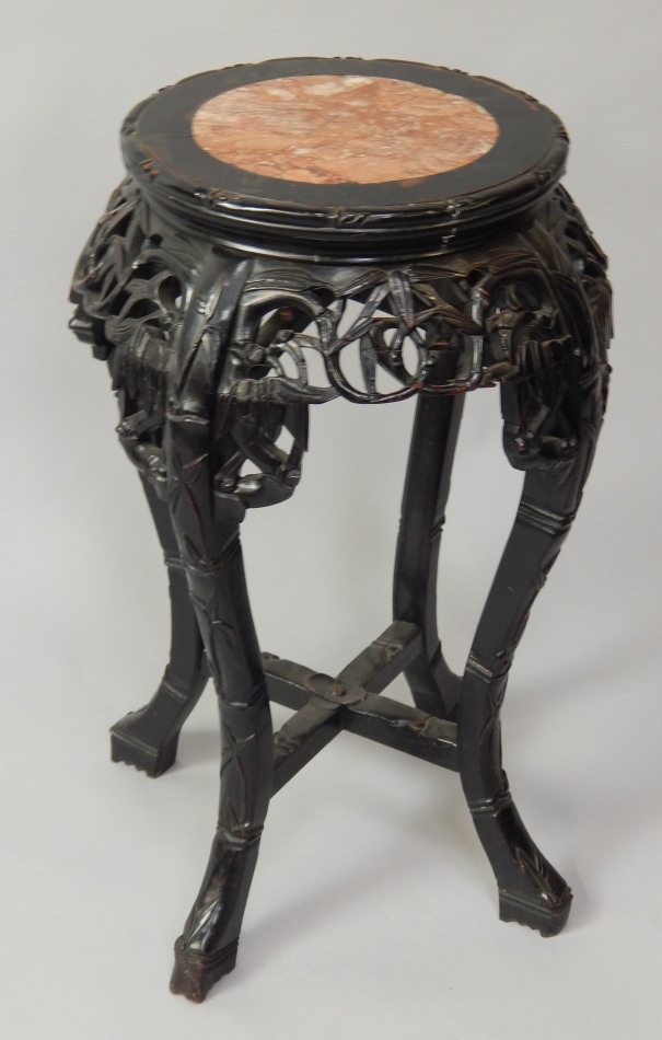 Appraisal: A thC Chinese ebonised hardwood jardiniere stand with grey and