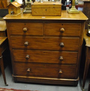 Appraisal: A Victorian mahogany chest of two short and three long