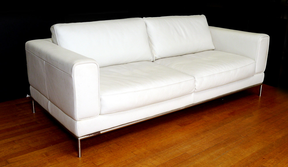 Appraisal: NATUZZI WHITE LEATHER MODERNE SOFA Clean moderne design on chrome