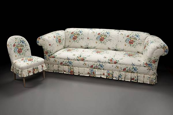 Appraisal: An American floral upholstered sofa and side chair mid th