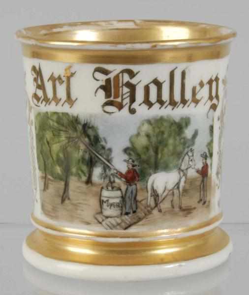 Appraisal: Man Spraying Trees Shaving Mug Description Marked Art Galley on