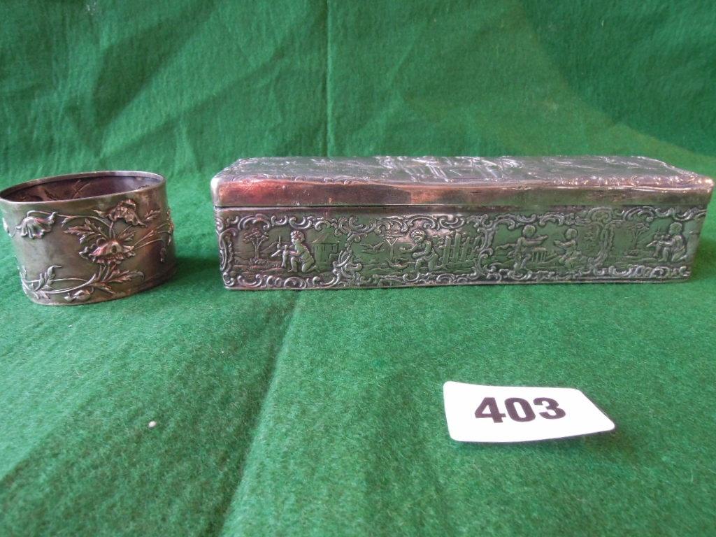 Appraisal: A silver oblong pen box with romantic pastoral scenes to