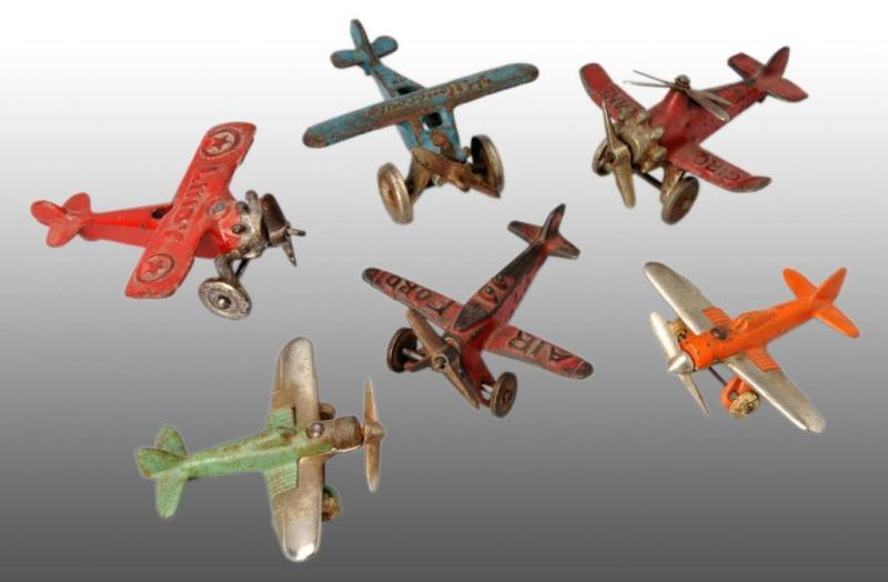 Appraisal: Lot of Cast Iron Arcade Hubley Airplane Toys Description Includes