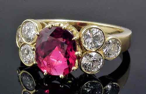 Appraisal: A modern ct gold mounted ruby and diamond dress ring