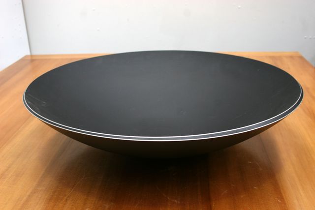 Appraisal: A large black powder coated aluminium and rubber fruit bowl