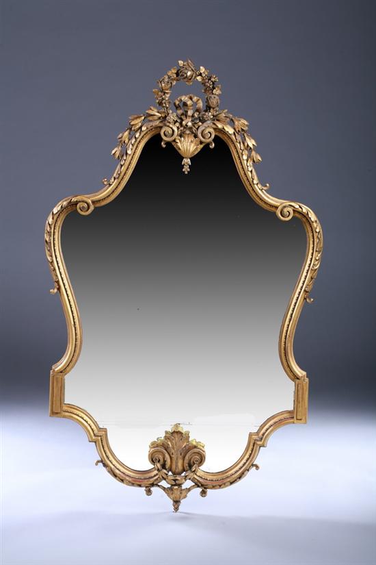 Appraisal: CONTINENTAL TRANSITIONAL STYLE GILTWOOD MIRROR th century Cartouche-form with ribboned