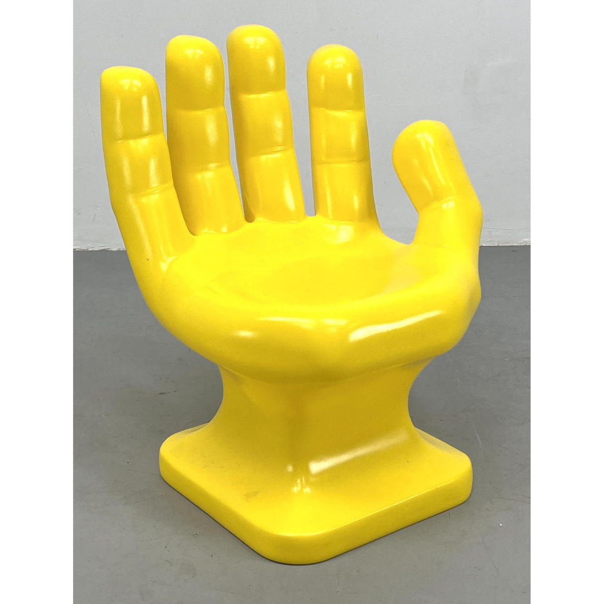 Appraisal: Yellow Plastic Hand Chair Hand shaped chairs Dimensions H inches