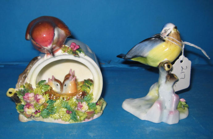 Appraisal: Royal Doulton Floral Robin with Nest of Chicks and Floral