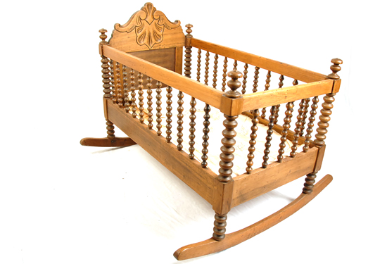 Appraisal: A th C Wooden Cradle having a carved and shaped