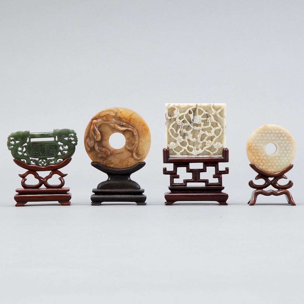 Appraisal: Group of Chinese Jade Carvings on stands Group of four