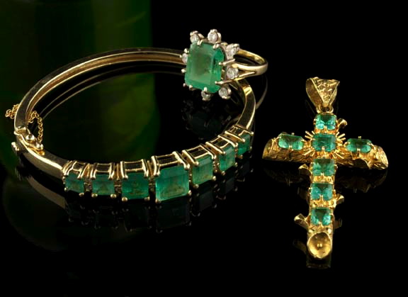 Appraisal: Fourteen-Karat Yellow Gold and Emerald Bangle Bracelet composed of seven