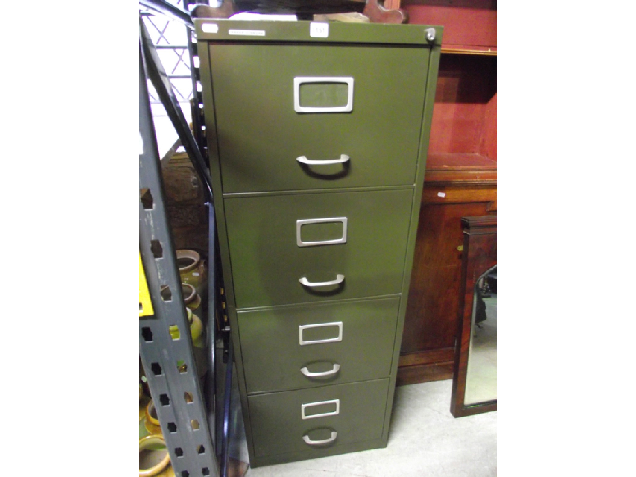 Appraisal: A Roneo Vickers four drawer steel filing cabinet in olive