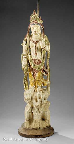 Appraisal: A Chinese Carved Wood and Polychrome-Decorated Figure of a Guanyin