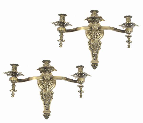 Appraisal: A pair of brass three light sconces height in width