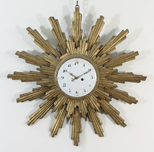 Appraisal: A French wall clock in a sunburst carved case cm