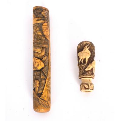 Appraisal: A Japanese bone pipe case Meiji period carved with two