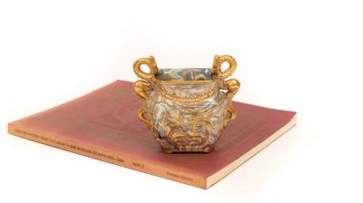 Appraisal: A Doulton marqueterie vase with twin dragon handles in gilt