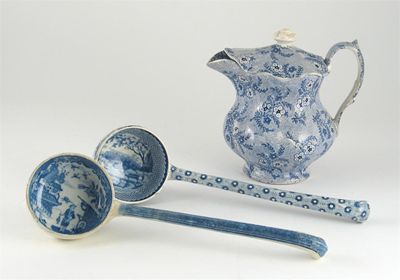 Appraisal: A Brameld ladle printed in blue with figures in a