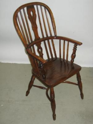 Appraisal: AN ASH AND ELM WINDSOR ARM CHAIR of high hooped