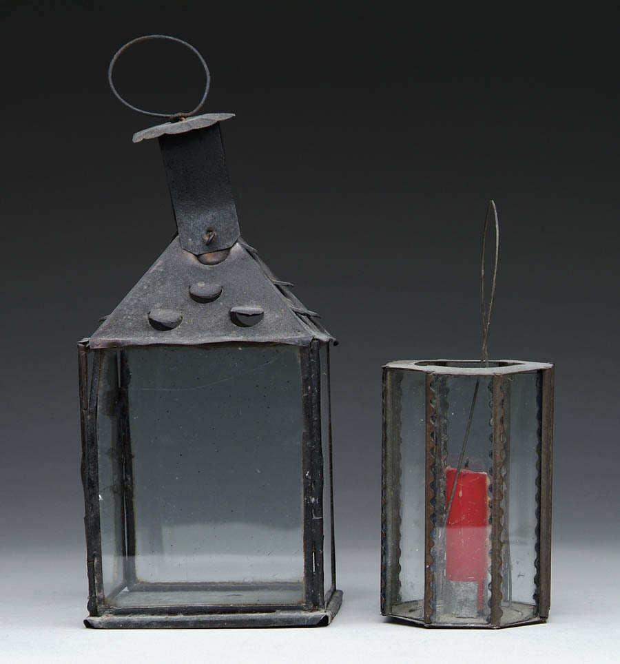 Appraisal: TWO TIN LANTERNS Eight sided glass and tin lantern has