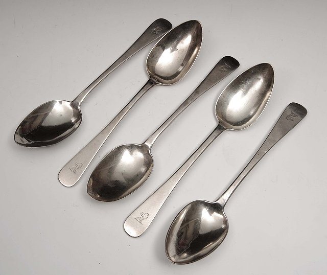 Appraisal: A collection of five white metal old pattern table spoons