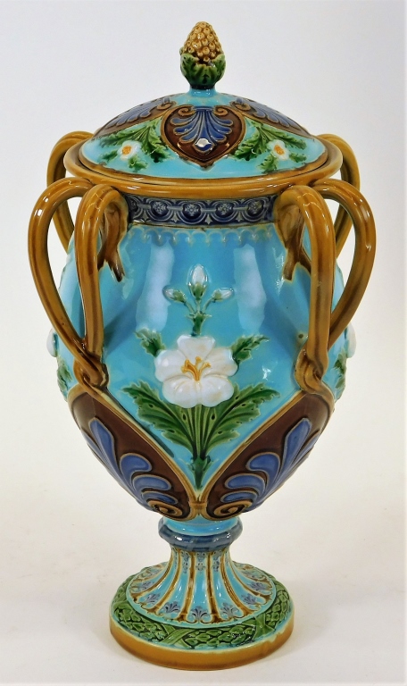 Appraisal: FINE MINTON ENGLISH MAJOLICA FLORAL HANDLED URN England Late th