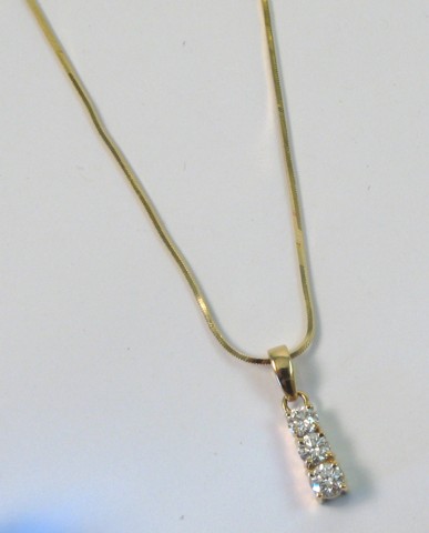 Appraisal: DIAMOND AND GOLD PENDANT NECKLACE the k gold pendant is