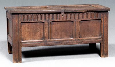 Appraisal: Early British carved oak chest double-paneled hinged top carved and