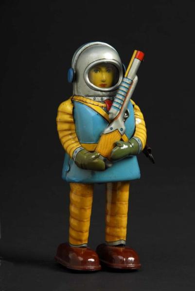 Appraisal: Tin Space Trooper Description Japanese Made by Haji Working When