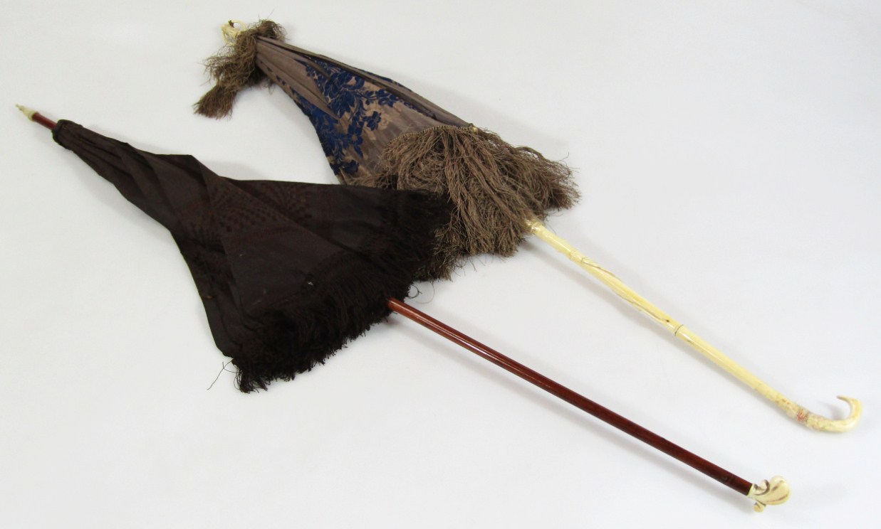 Appraisal: An early thC umbrella with carved ivory handle cm high