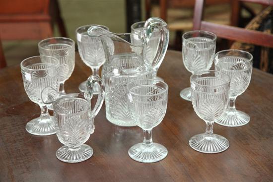 Appraisal: PATTERN GLASS WATER SET Flint glass set in Ribbed Palm