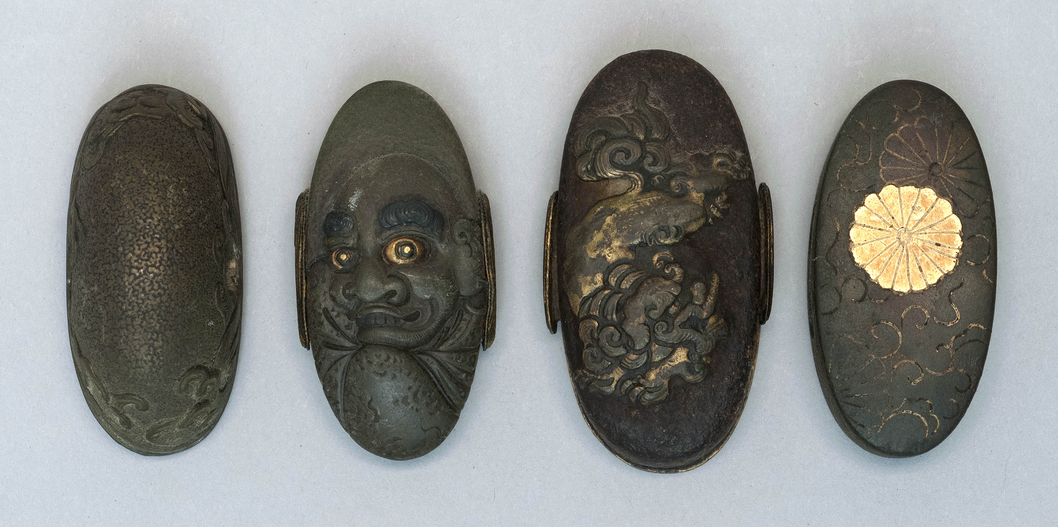 Appraisal: FOUR KASHIRA th CenturyDepicting Daruma a shishi chrysanthemums and rolling