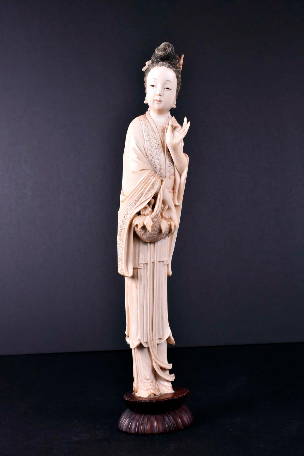 Appraisal: CHINESE CARVED FIGURE OF A MEIRENThe elegant young lady elegantly