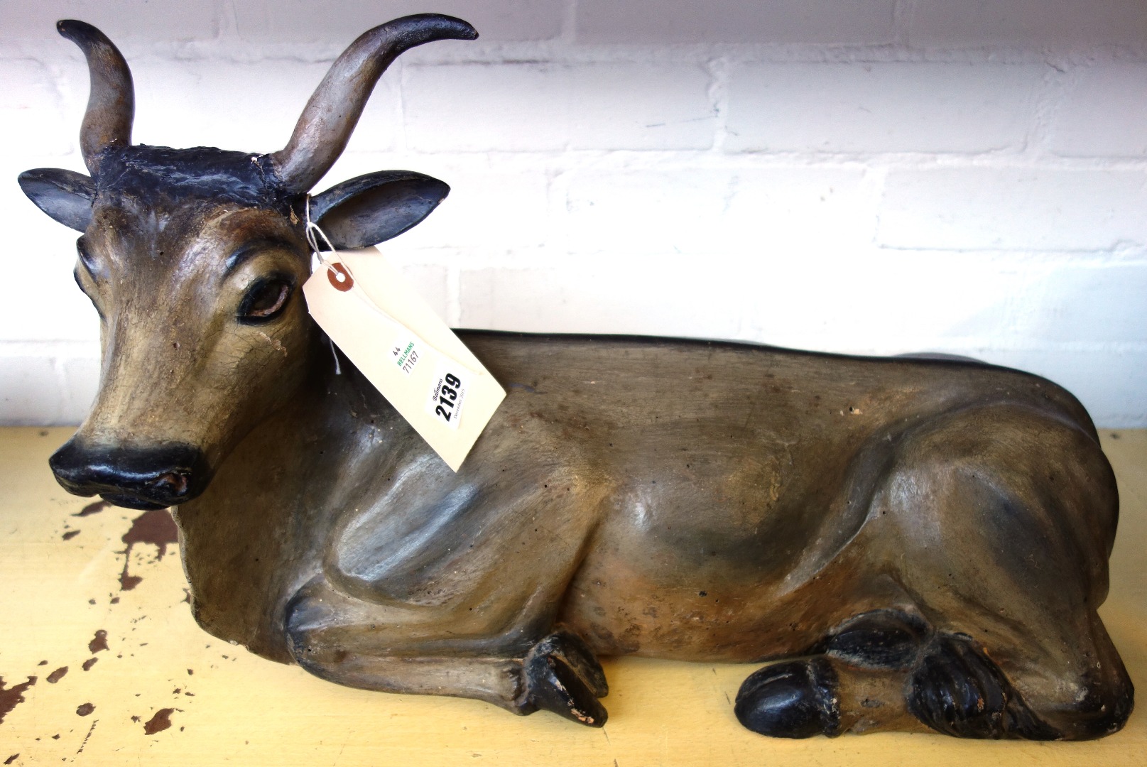 Appraisal: A polychrome painted wood manger figure modelled as a cow