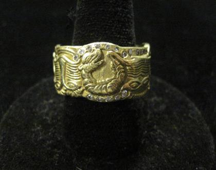 Appraisal: karat yellow gold band ring Dana BordmickTribal motif accented by