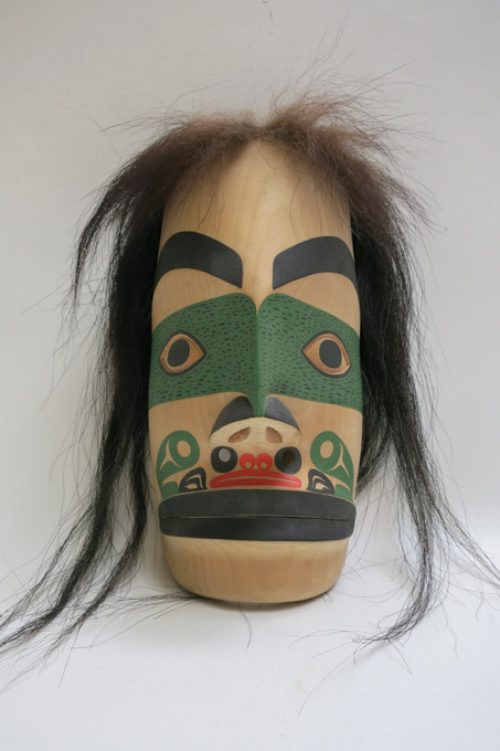 Appraisal: NORTHWEST COAST WOOD CARVED MASK with painted features and horse