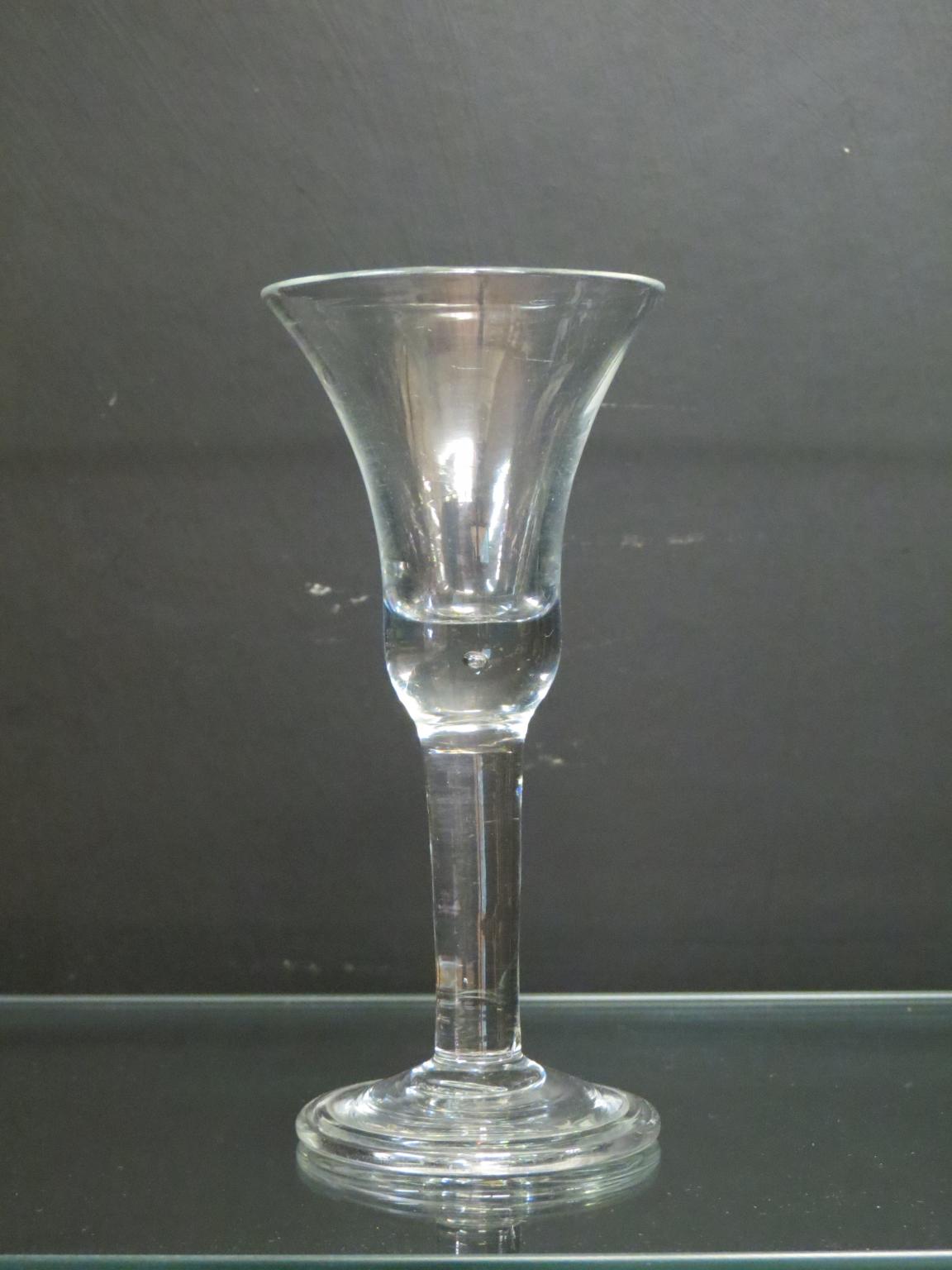 Appraisal: An th century English wine glass bell-bowl with single air