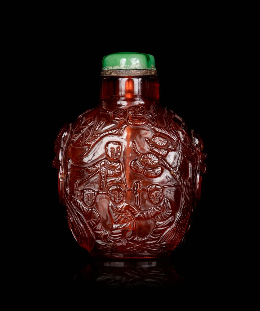 Appraisal: A Carved Amber Snuff Bottle Height overall in cm A