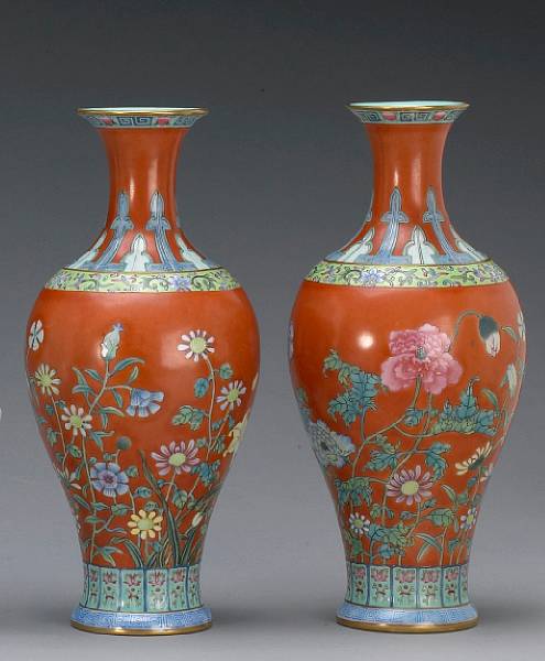 Appraisal: A pair of russet ground baluster vases with famille rose