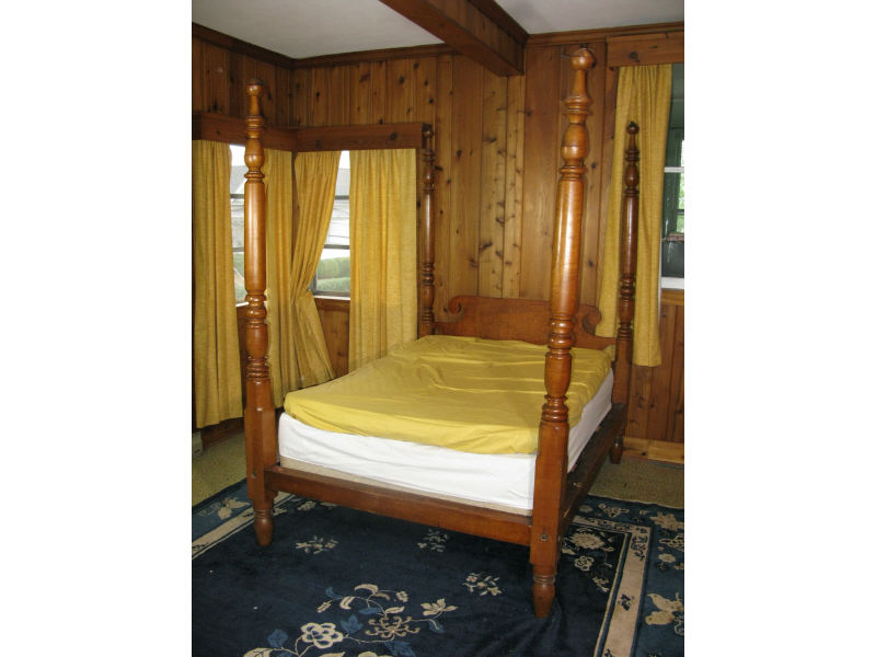 Appraisal: American Tall Post Bed ca figured tiger maple scrolled headboard