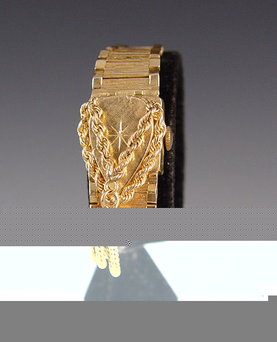 Appraisal: K GOLD GENEVE LADIES PEEK-A-BOO WATCH K gold watch jewel