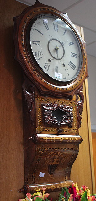 Appraisal: AN AMERICAN TH CENTURY WALNUT CASED DROP DIAL WALL CLOCK