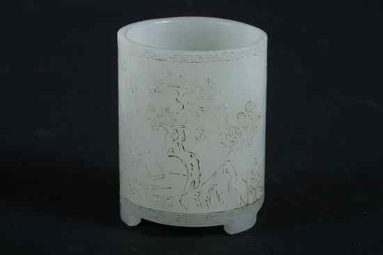 Appraisal: CHINESE LIGHT CELADON JADE BRUSH HOLDER Incised to depict mountainous