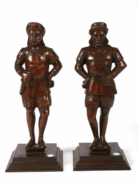 Appraisal: A pair of Continental carved wood figures in historic costume