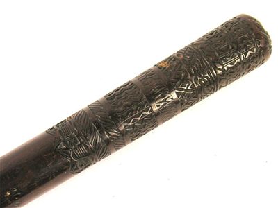 Appraisal: A th century Maori club inscribed club with bands of