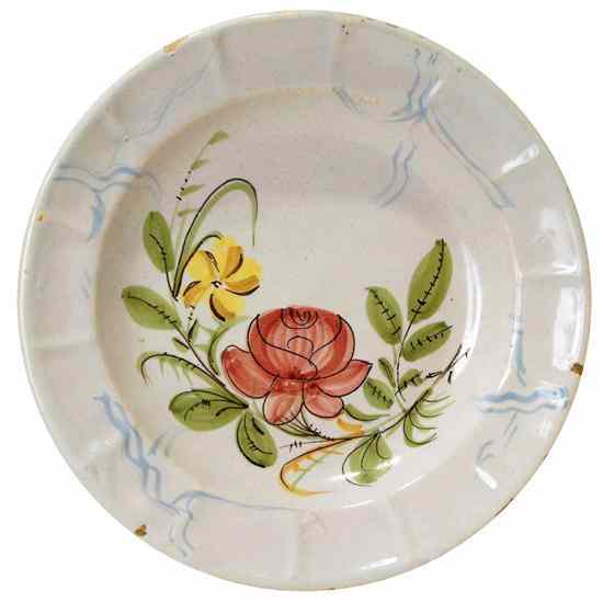 Appraisal: A French Faience Pottery Floral Charger Plate circa a tin-glazed