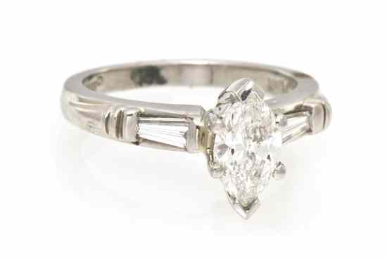 Appraisal: A Platinum and Diamond Solitaire Ring Scott Kay containing one